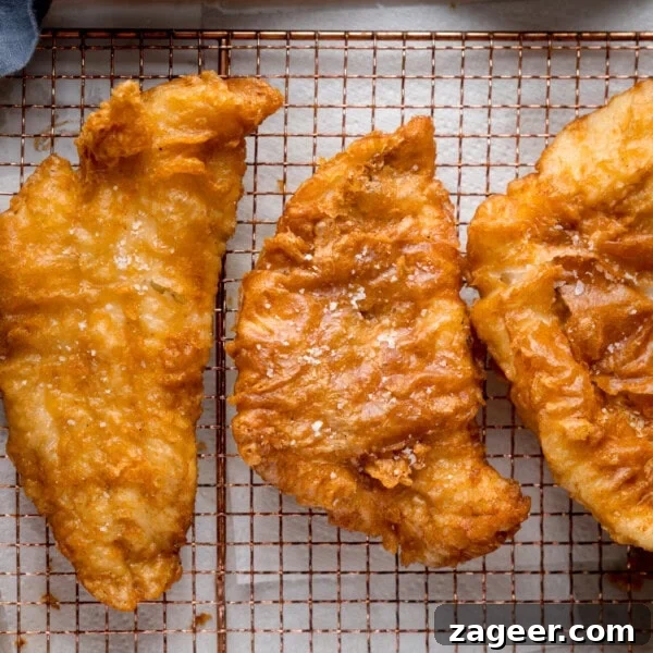 Authentic Cornish Pasty Recipe: Traditional British Meat Pasty Guide 13 Three fish fillets, battered in beer batter, golden and crisp.