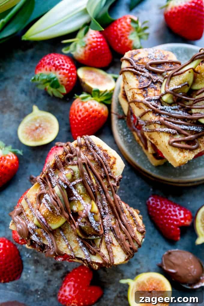 Valentine’s Nutella French Toast Hearts Recipe 3 Overhead photo of valentines French Toast Hearts with nutella drizzled on