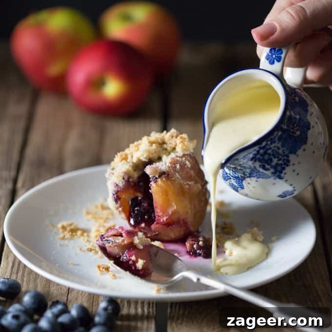 Stuffed Apples with Crumble Topping - Soft baked apples filled with blueberries and topped with a buttery crumble only 212 cals!