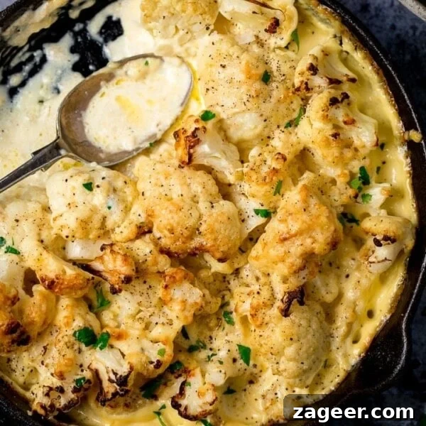 Asian-Style Baked Cauliflower Wings: Sticky Sesame Chili Recipe 12 Cauliflower cheese in a pan with a spoon in pan