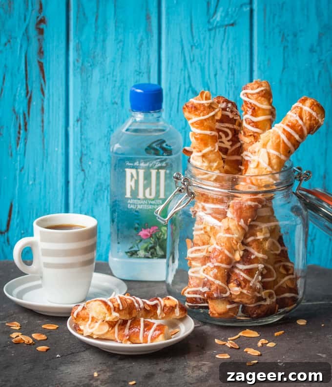 Almond Croissant Twists: Flaky, Buttery Pastry Recipe 2 Croissant twists - flaky croissant pastry, filled with almond paste and drizzled with creamy almond frosting.