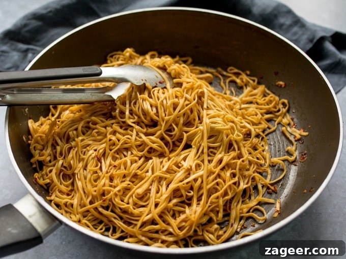 Honey-Soy Chicken Stir-Fry with Spicy Asian Noodles 5 Pan of asian-style noodles