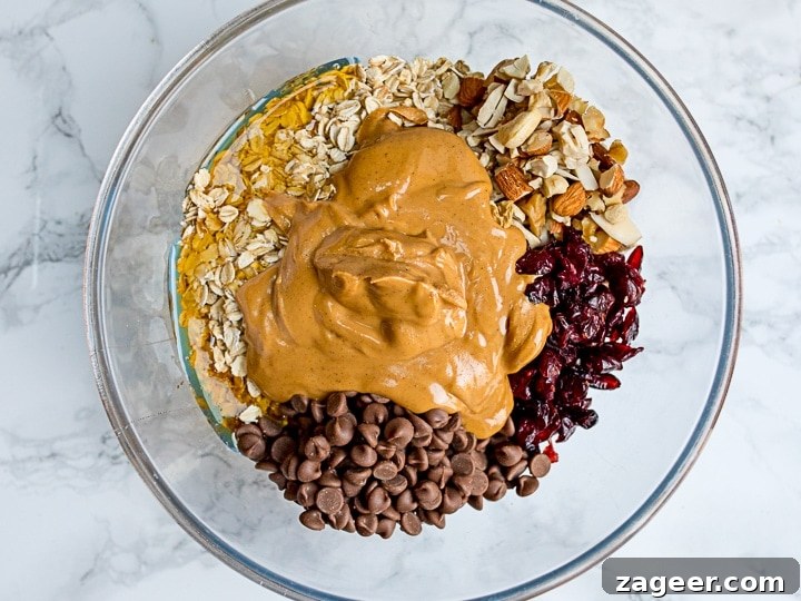 No-Bake Peanut Butter Granola Bars Recipe (Quick & Chewy) 3 Ingredients for granola bars in a bowl