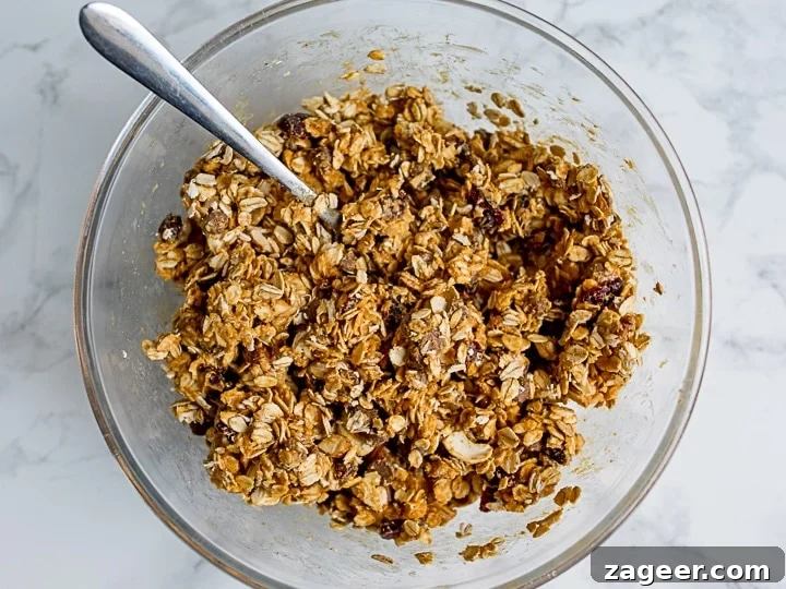 No-Bake Peanut Butter Granola Bars Recipe (Quick & Chewy) 5 Granola bar mixture in a bowl