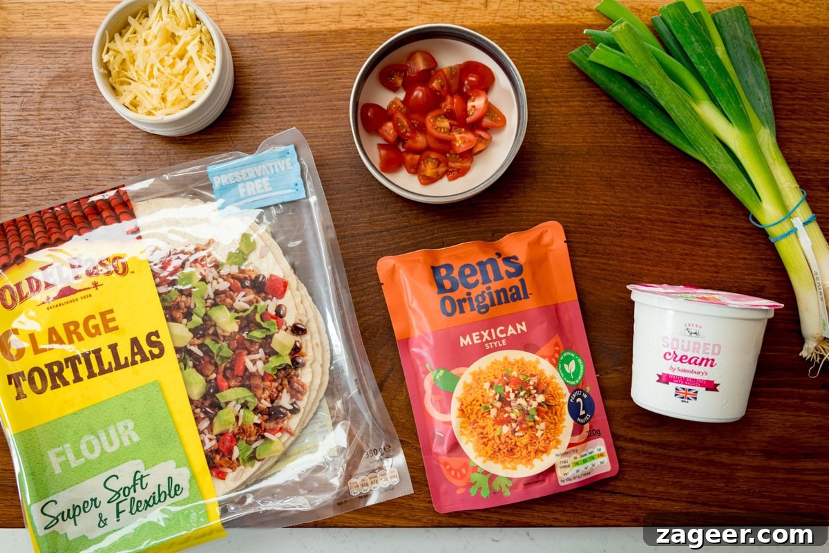 Mini Chicken and Bean Burritos with Zesty Salsa Recipe 4 Ingredients for mini burritos - except the meat filling - on a wooden board.