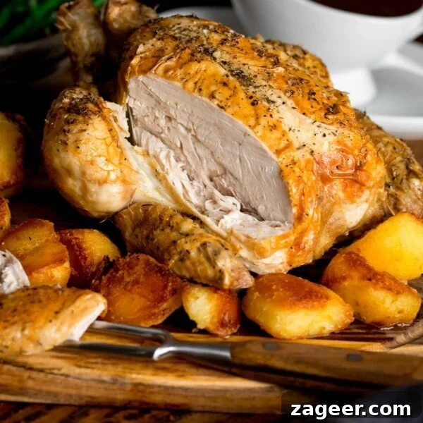 Creamy Scalloped Potatoes with Ham and Cheese Bake 16 Sliced roast chicken on a board with potatoes and gravy.