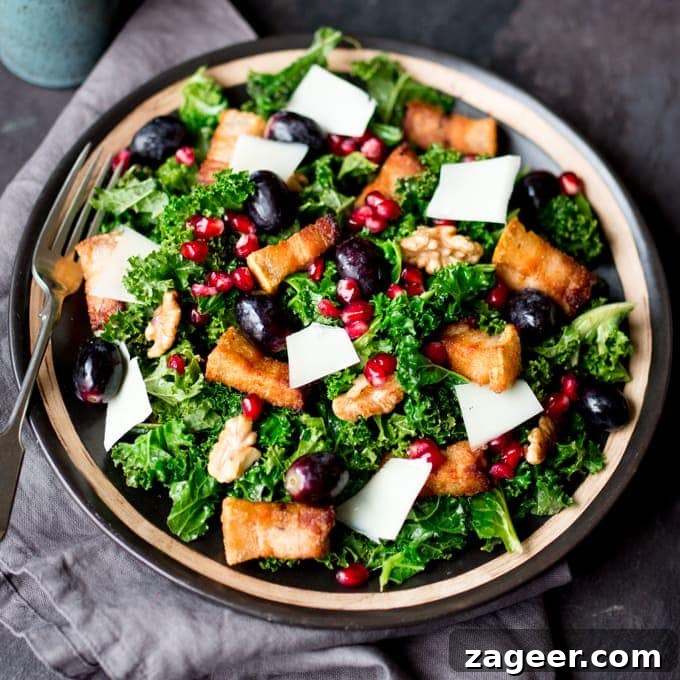 Warm Kale and Pork Belly Salad with Pomegranate Vinaigrette 3 Comforting warm kale salad with crisp slow-cooked pork belly & pomegranate dressing