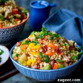 Pantry-Friendly Recipes: Delicious Meals from Store Cupboard Staples 15 Square image of a bowl of fried rice on blue background