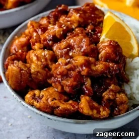 Bowl of Chinese Orange Chicken with rice