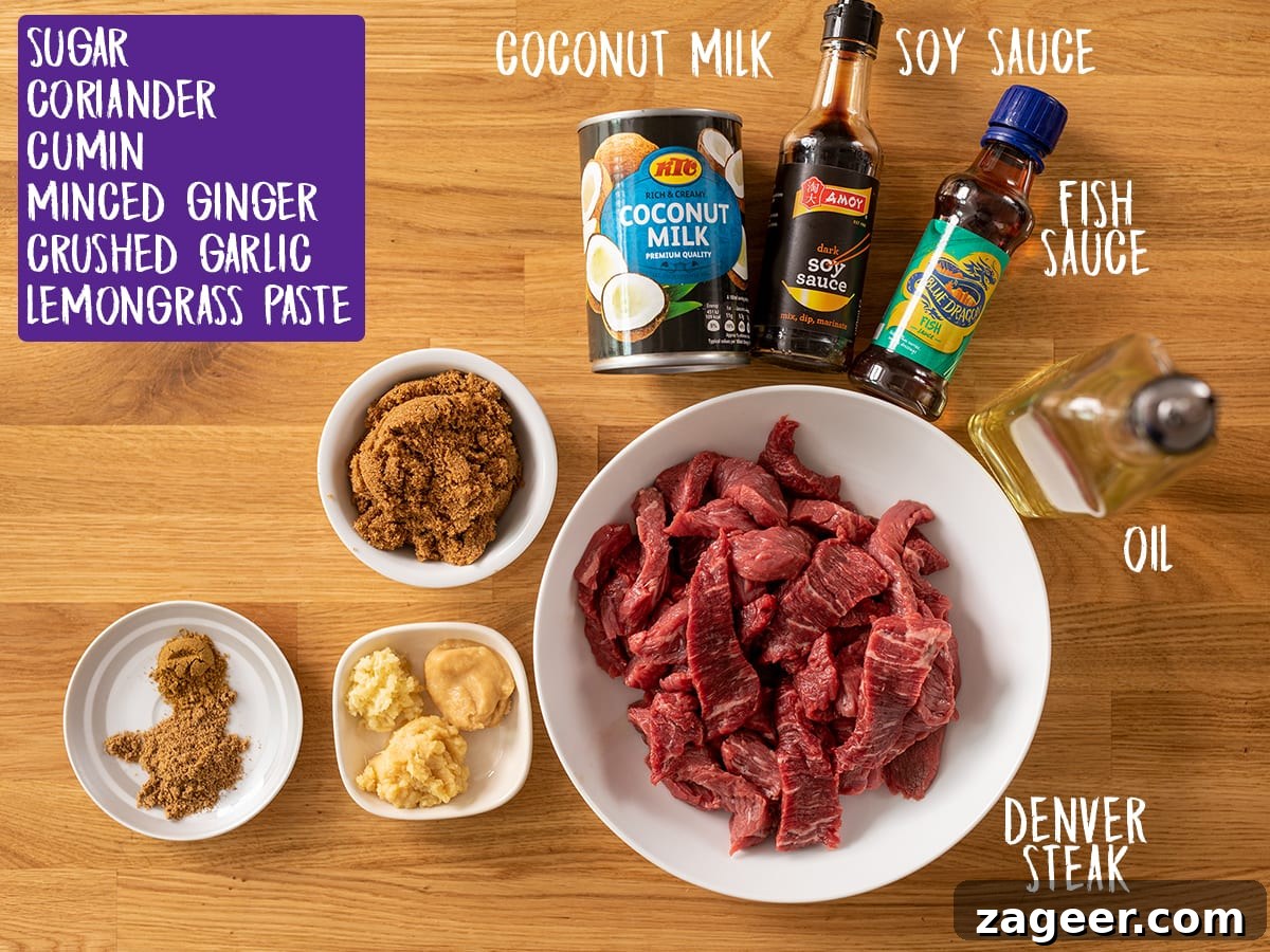 Grilled Beef Satay Recipe: Tender Skewers with Peanut Sauce 4 Ingredients to make beef satay on a wooden table