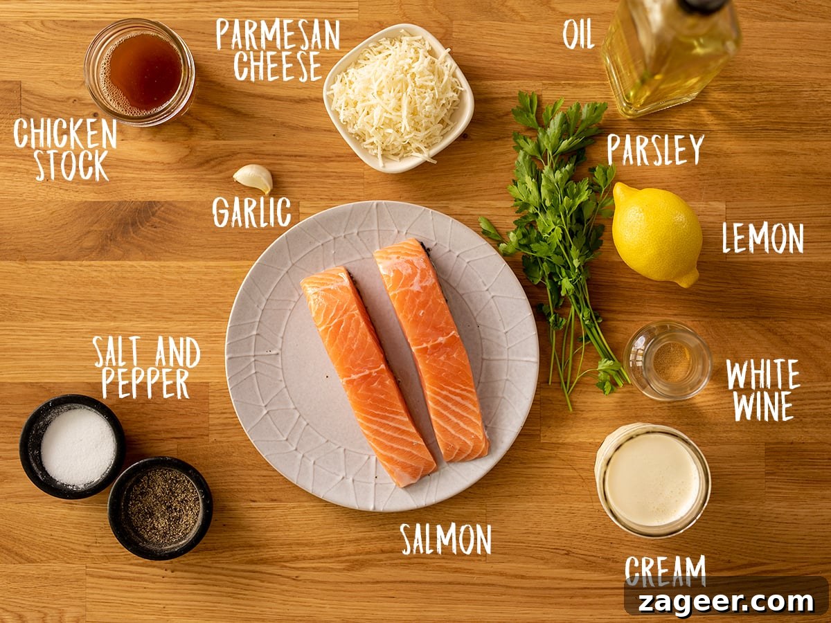 Creamy White Wine Salmon Recipe with Garlic and Herbs 3 Ingredients for salmon with creamy white wine sauce on a wooden table
