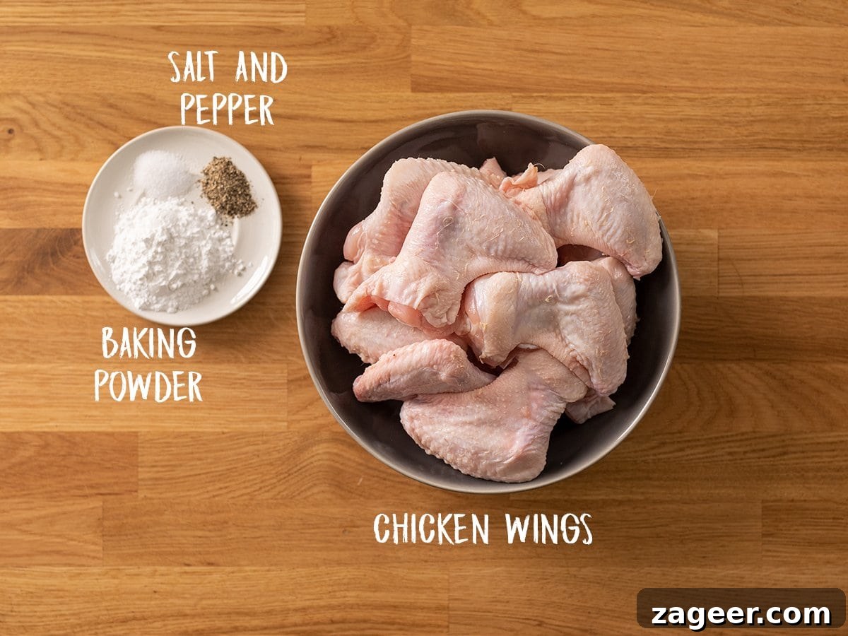 Perfect BBQ Chicken Wings Recipe: Juicy, Crispy & Smoky 4 Ingredients for crispy chicken wings on a wooden table