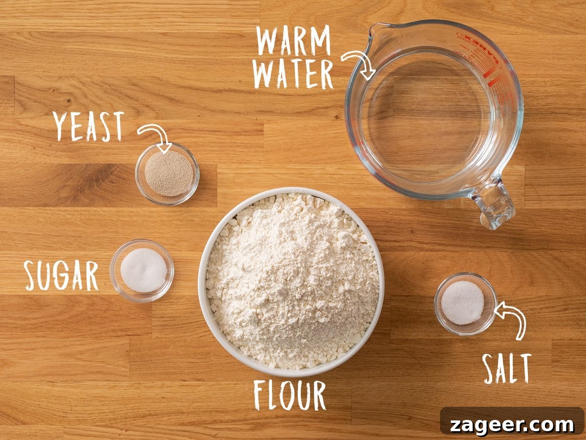 Authentic Artisan Bread Recipe: Simple Sourdough & Crusty Loaf Guide 3 Ingredients for making Artisan Bread on a wooden table