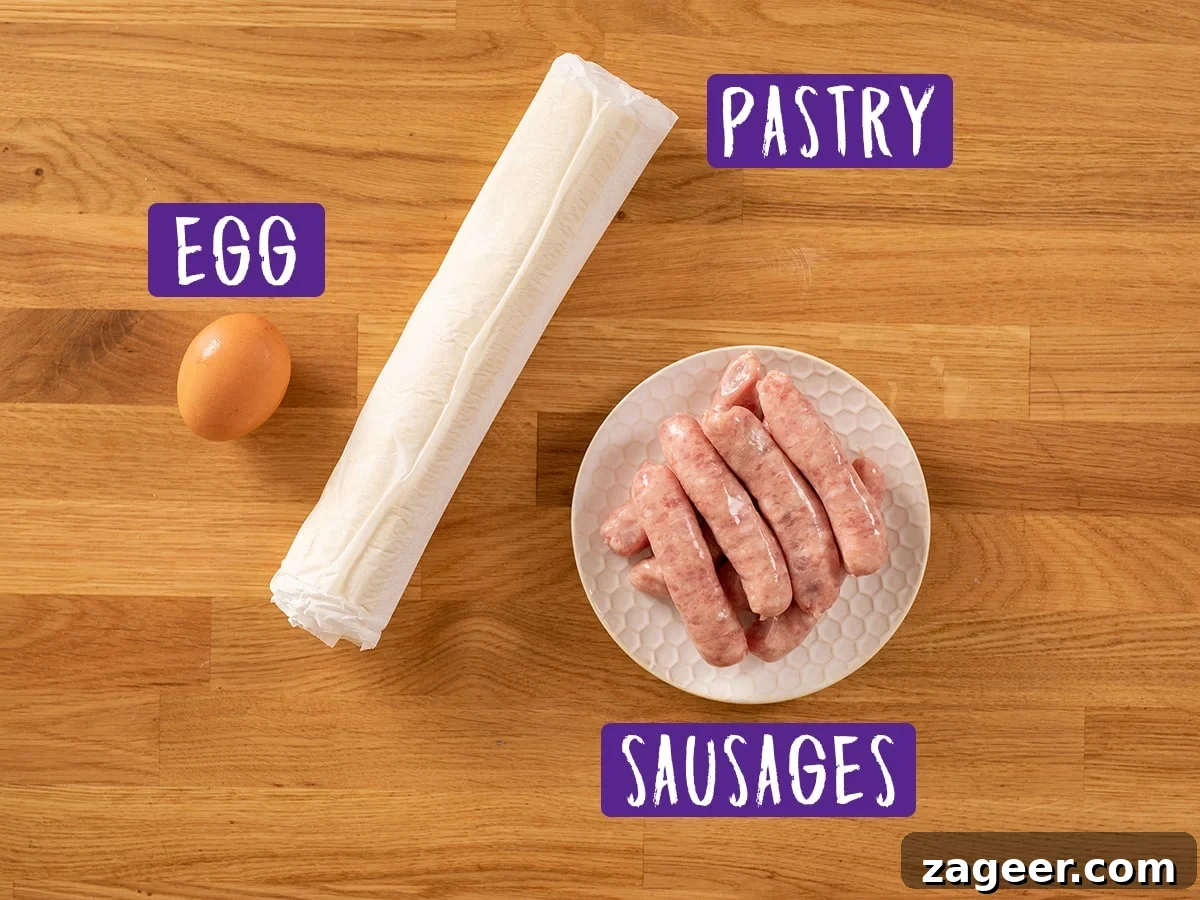 Crispy Homemade Sausage Rolls Recipe for Perfect Party Snacks 4 Ingredients for sausage rolls on a wooden board