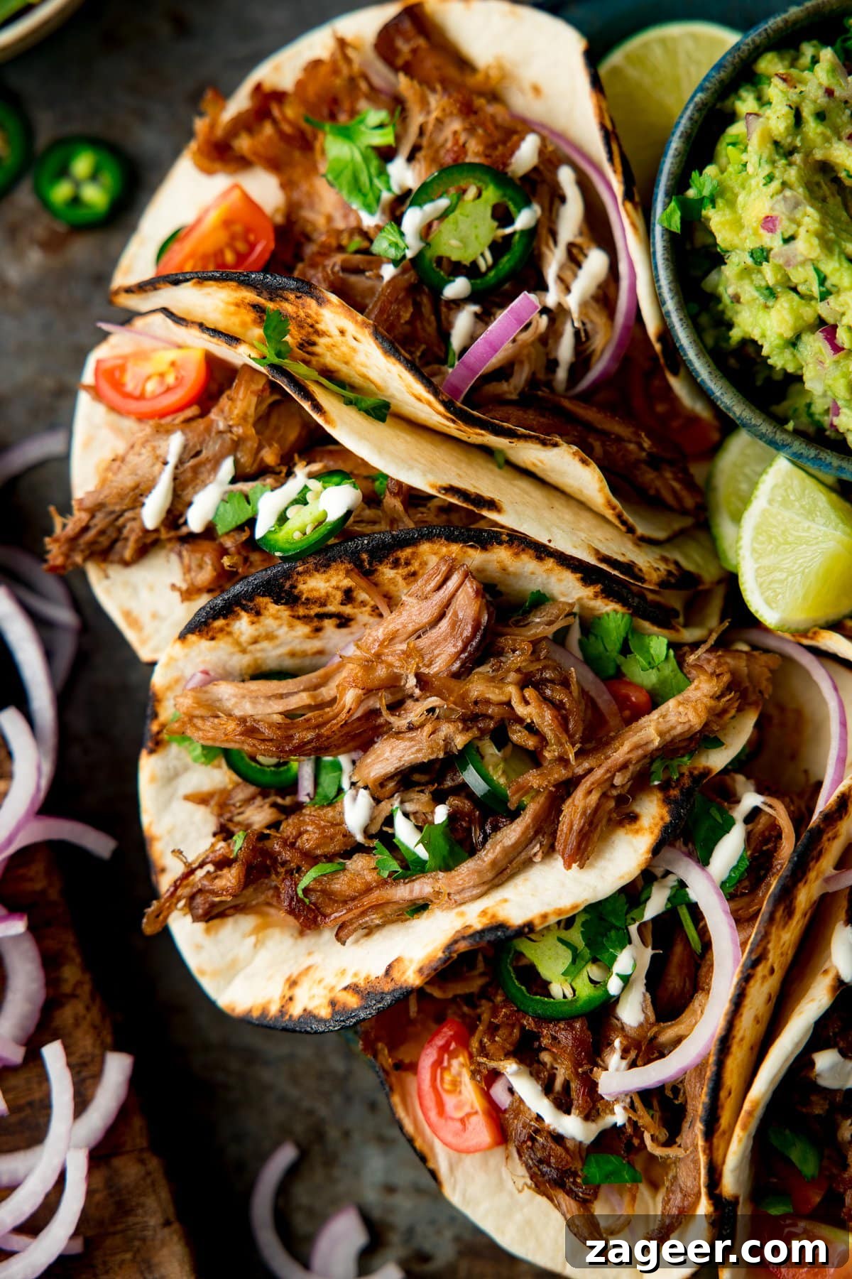 Authentic Lamb Barbacoa Recipe — Slow-Cooked Mexican-Style Lamb 7 Lamb Barbacoa Carnitas Tacos piled up on a plate