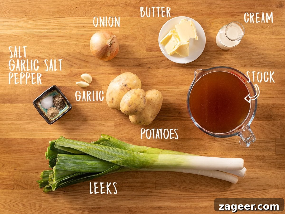 Creamy Leek and Potato Soup Recipe with Fresh Herbs 3 Ingredients for leek and potato soup on a wooden table