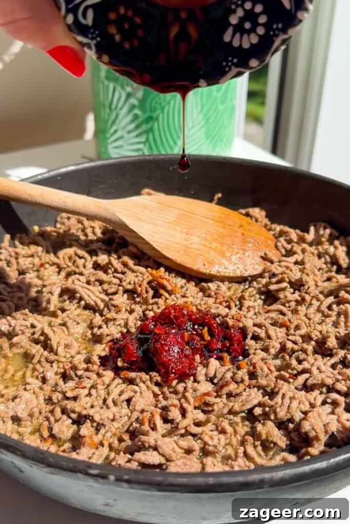 Mediterranean Ground Beef and Rice Bowls with Feta & Herbs 10 Harissa paste and seasoning added to ground beef.