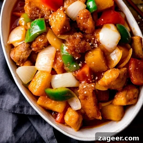 Turkey Bolognese from Leftover Roast: Quick Family Dinner 7 Overhead of Sweet and sour turkey with peppers and onions in a white oval bowl