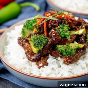 Crispy Tangy Beef with Broccoli in Sweet Glaze 6 Bowl of rice topped with crispy beef strips in a tangy spicy sauce with broccoli.