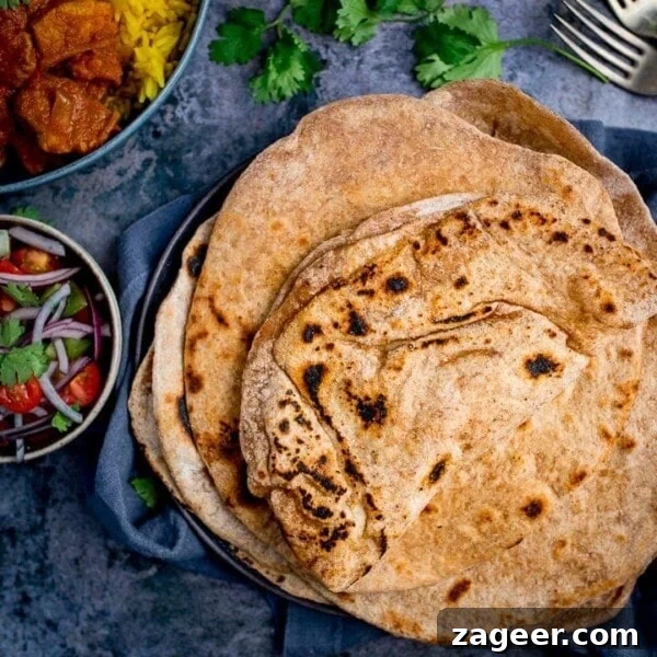 Creamy Chicken Pasanda Recipe: Aromatic Mughlai Curry Guide 8 Stack of Chapati on a plate on blue background
