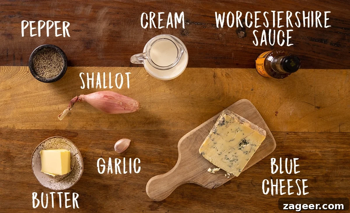 Creamy Blue Cheese Sauce Recipe for Steak and Wings 3 A picture of the ingredients, shallot, garlic, Worcestershire sauce, cream, blue cheese, pepper and some butter
