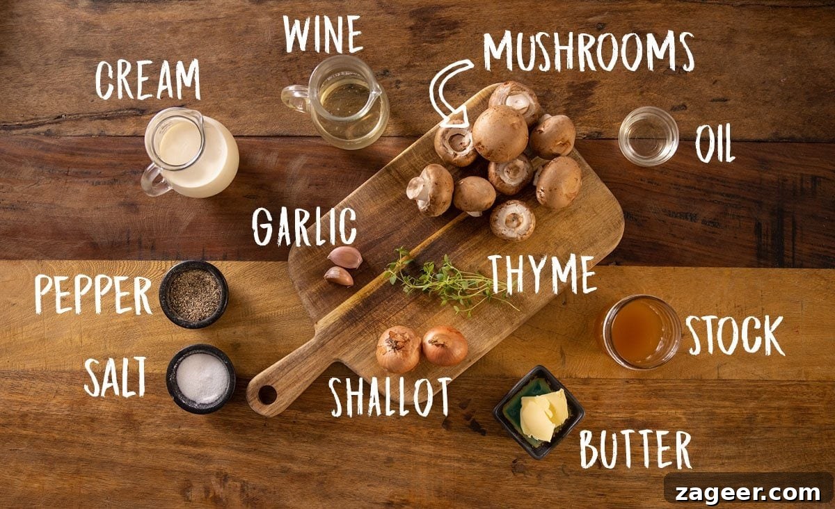 Creamy Mushroom Sauce Recipe for Pasta, Steak & Chicken 4 A wooden table with butter, mushrooms, thyme, shallots, garlic, wine, cream and salt and pepper on a wooden board