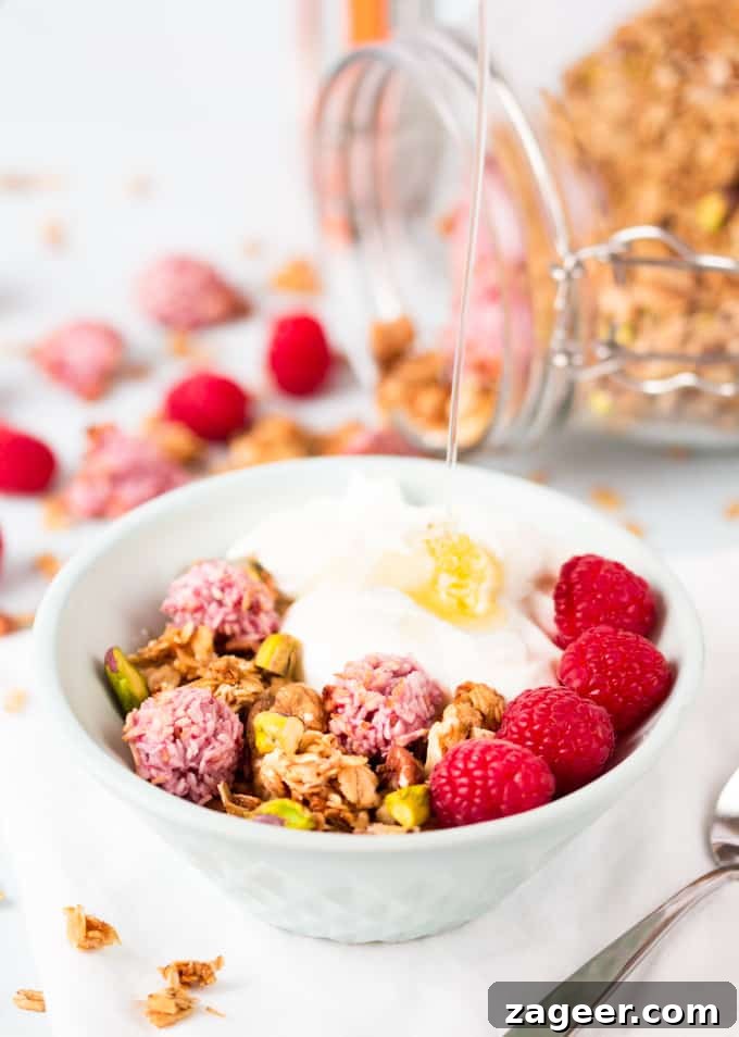 Raspberry Macaroon Granola Recipe — Coconut & Almond Clusters 3 coconut granola topped fresh raspberry macaroons