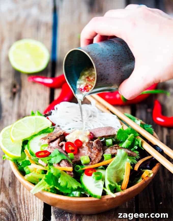 Vietnamese Grilled Steak Salad with Fresh Herbs and Lime Vinaigrette 2 Crisp salad with noodles, tender steak and a spicy dressing - only 270 calories!