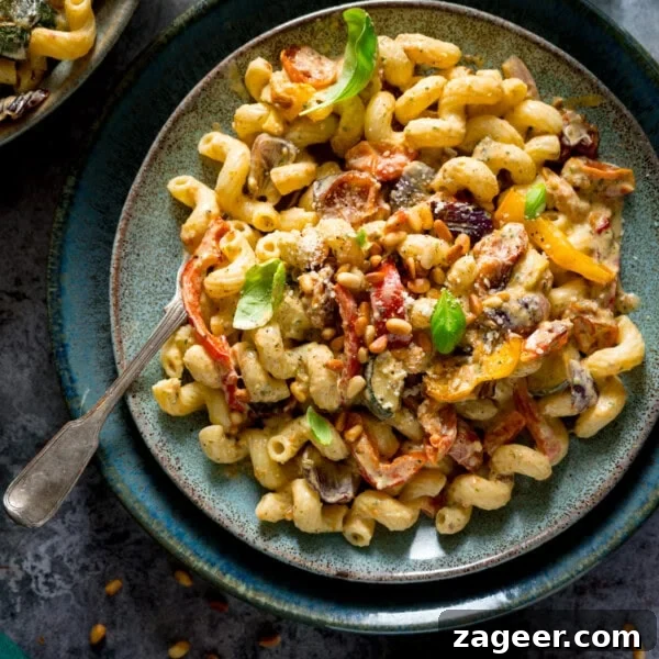 Creamy Mushroom Pasta Recipe with Garlic and Parmesan 9 Roasted vegetable pesto pasta topped with basil leaves and pine nuts
