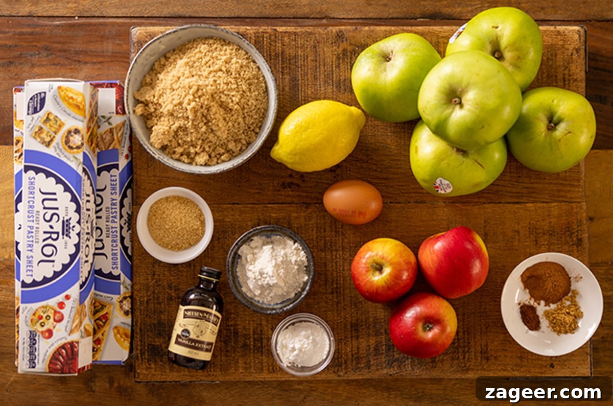 Ultimate Deep-Dish Apple Pie Recipe for Perfect Crust and Filling 3 Ingredients for apple pie laid out on a wooden board.