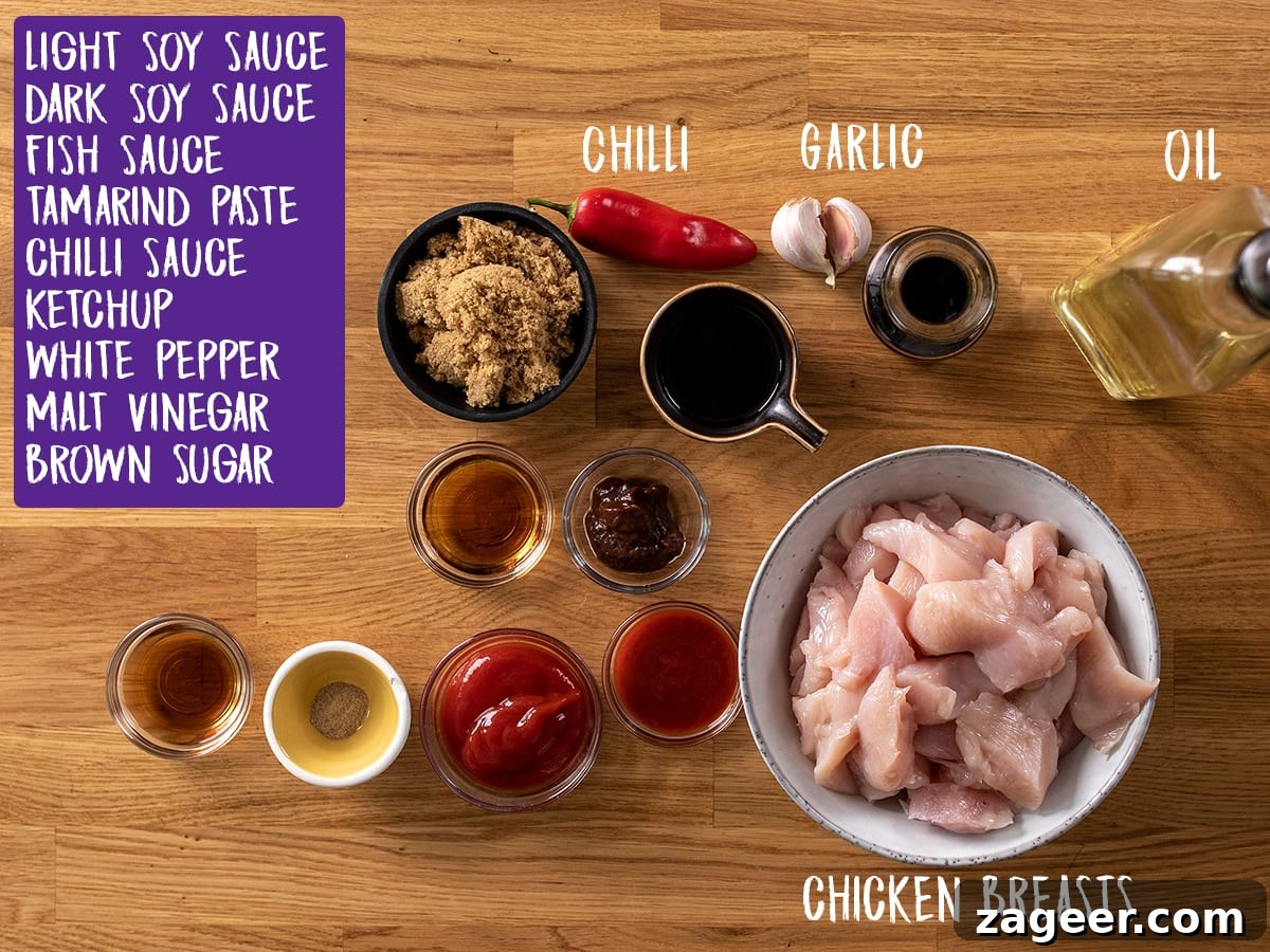 Spicy Firecracker Chicken Recipe with Crispy Bites 4 Firecracker chicken ingredients on a wooden background