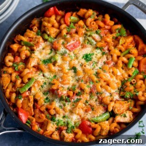 30-Minute One-Pot Chicken Pasta Recipe for Busy Weeknights 6 Close up of pan of cheesy chicken pasta