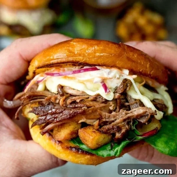 Smoky Barbecue Baked Beans Recipe for Summer Cookouts 8 Brisket sandwich with potatoes and coleslaw.