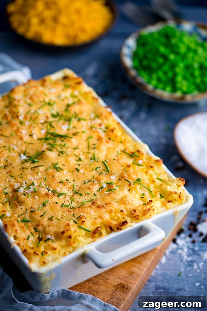 Fish pie with mashed potato in a white rectangular dish