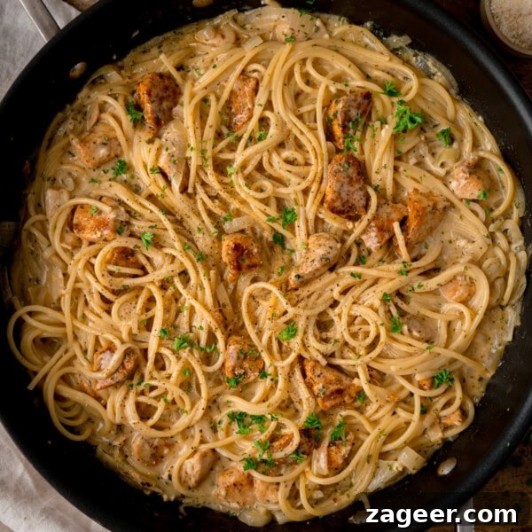 Classic Chicken Cacciatore Recipe: Rustic Italian Hunter’s Chicken 8 Overhead square image of a skillet filled with creamy Garlic Butter Chicken Pasta.