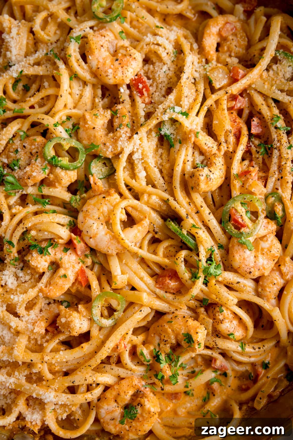 Creamy Cajun Shrimp Pasta Recipe — Quick Spicy Dinner 2 Extreme close up prawn linguine in a creamy buffalo sauce.