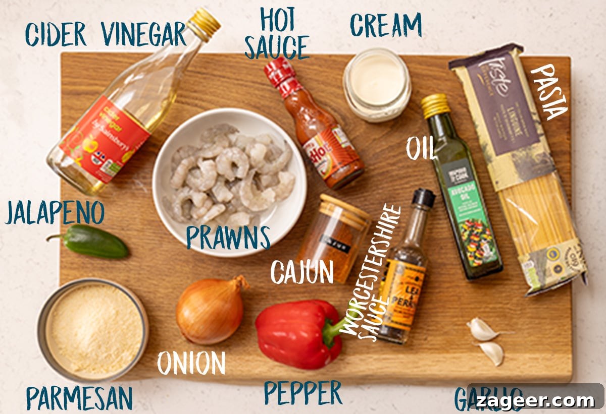 Creamy Cajun Shrimp Pasta Recipe — Quick Spicy Dinner 4 Ingredients for Cajun prawn linguine on a wooden board.