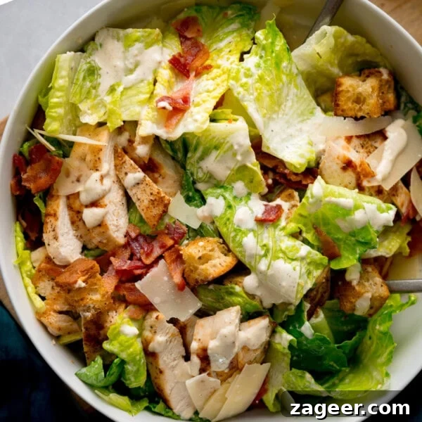 Lemon-Dill Salmon Orzo Pasta Salad for Weeknight Meals 12 Chicken Caesar salad in a white bowl.