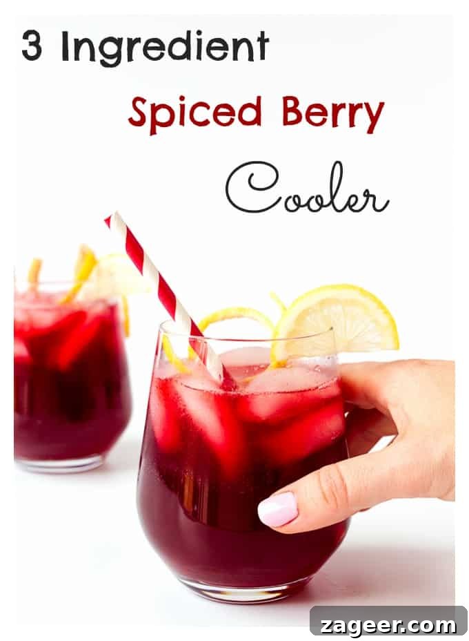 Spiced Berry Cooler Recipe: Refreshing Summer Drink with Warm Spices 2 Spiced Berry Cooler - A punchy and refreshing non-alcoholic cocktail. Serve over ice for the perfect summer BBQ drink.