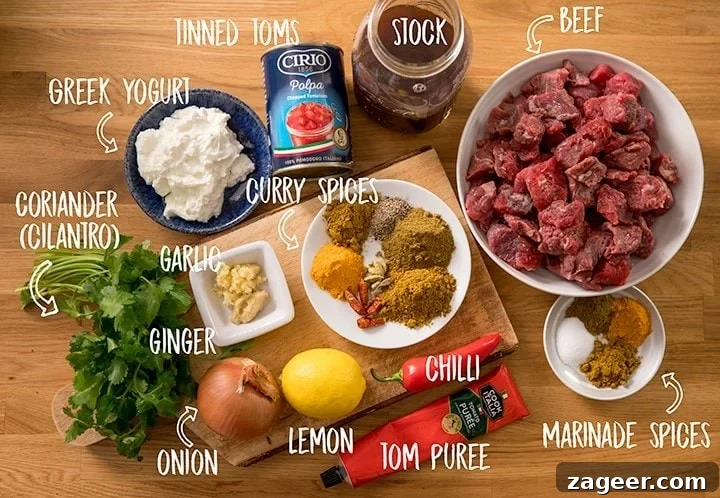 Low-Fat Slow-Cooked Spicy Beef Curry Recipe 4 Ingredients for slow cooked lighter beef curry on a wooden table
