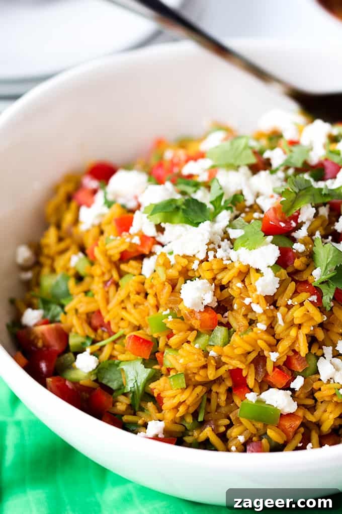 Sugar-Spiced Salmon with Herbed Pilaf Recipe 3 Spiced caramelised salmon served on a bed of savoury rice with feta and veggies. Colourful, healthy and delicious!