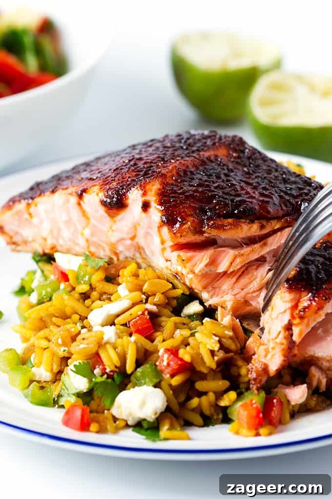Sugar-Spiced Salmon with Herbed Pilaf Recipe 4 Spiced caramelised salmon served on a bed of savoury rice with feta and veggies. Colourful, healthy and delicious!