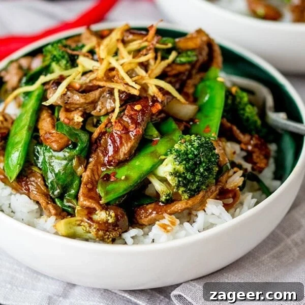 Quick and Flavorful Beef Stir-Fry with Garlic and Veggies 9 Ginger beef and broccoli in a bowl with rice