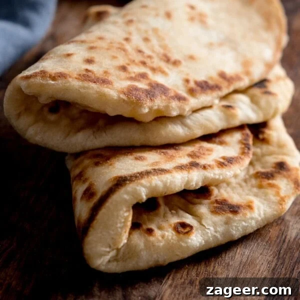 Stovetop Coconut Rice Recipe: Creamy, Fragrant Coconut Rice 6 Two folded flatbreads