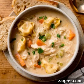 Creamy chicken and tortellini soup with rustic bread.