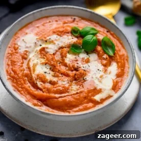 Tomato soup with basil cheese on toast.