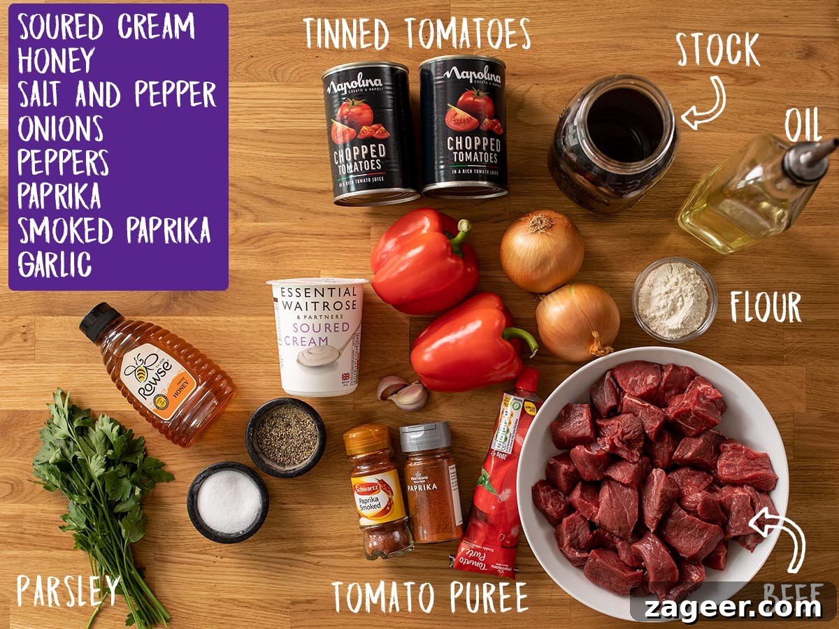 Authentic Hungarian Beef Goulash Recipe — Hearty Slow-Cooked Stew 4 Ingredients for Beef Goulash on a wooden table