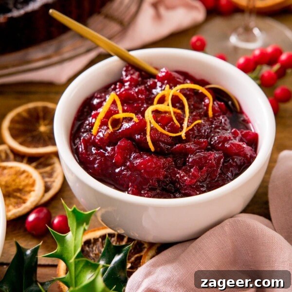 Make-Ahead Bacon Mashed Potato Casserole for Holiday Meals 8 Cranberry sauce in a white bowl with orange zest on top