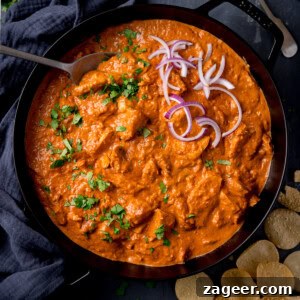 Leftover Turkey Curry Recipe: Flavorful Makeover for Leftovers 7 A square, overhead shot of leftover turkey curry in a black skillet.