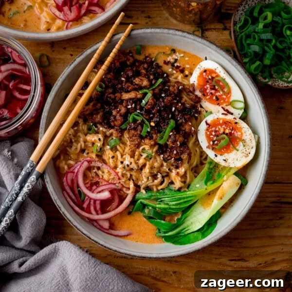 How to Make Soft, Chewy Dough Balls for Any Recipe 7 A bowl of spicy pork coconut curry ramen with sliced boiled eggs, pak choi, pickled onions and spring onions.